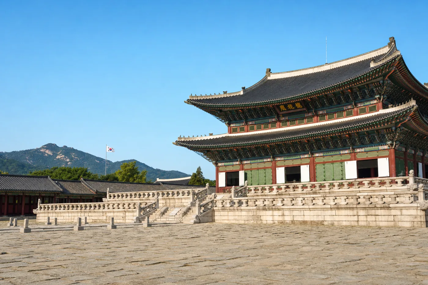 Kjent landemerke i Sør-Korea med landets flagg